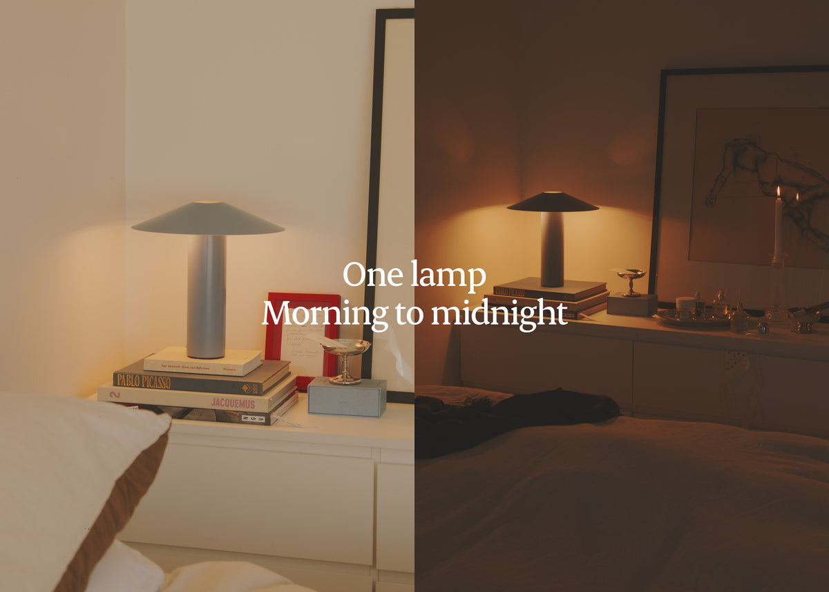 Hoist Lamp in Faded Denim on a bedroom dresser by day and by night, with the line One lamp, morning to midnight - Dennis Did It