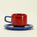 ceramic cup and saucer - red and blue colourway - Dennis Did It