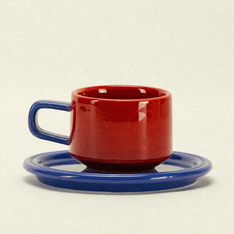 ceramic cup and saucer - red and blue colourway - Dennis Did It
