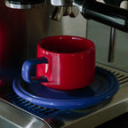 ceramic cup and saucer - red and blue colourway - Dennis Did It