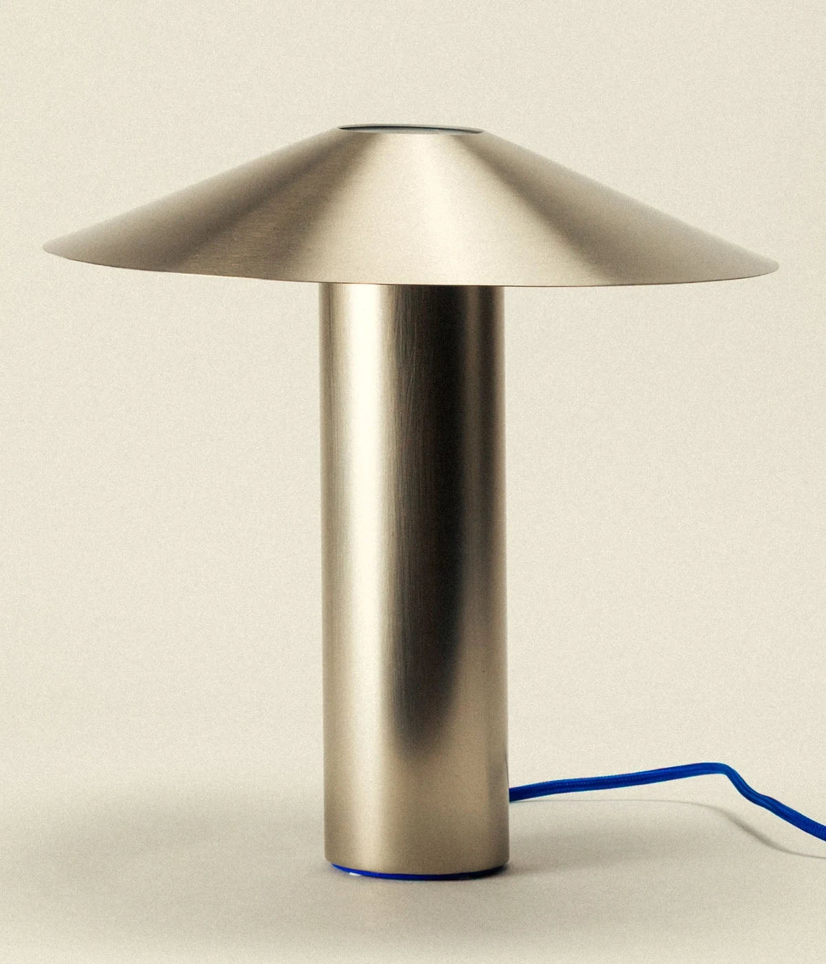 Hoist Lamp in brushed metal lighting a quiet corner - Dennis Did It